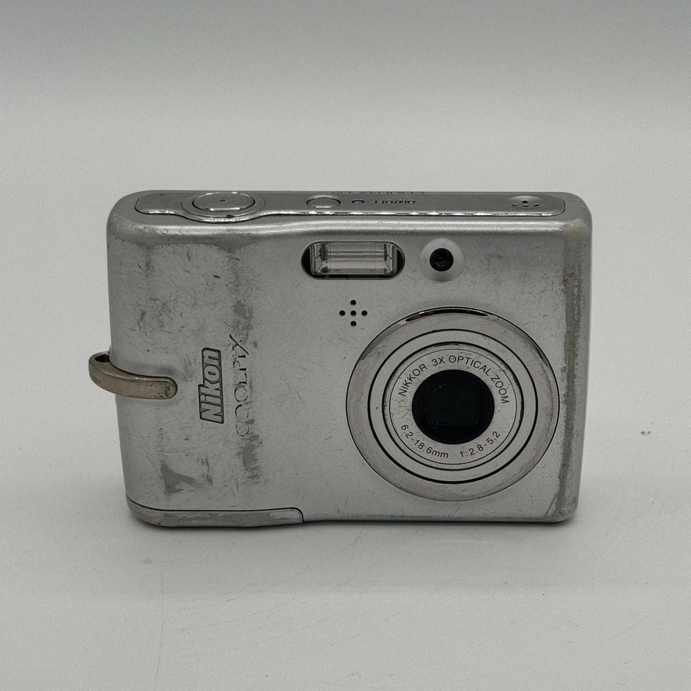 Nikon Coolpix L10 Silver Digital Camera 5.0MP 3x Optical Zoom Bundle Working